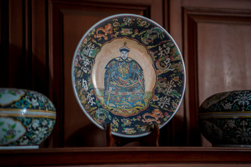 Chinese antiques on top of a wooden cabinet