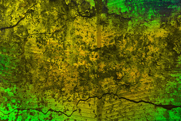 Canvas Print - Abstract bright green and orange grunge background. Texture of stone and concrete with cracks and spots