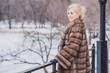 © T.Den_Team - Vogue concept. Beautiful lady in holidays, modern woman wear fur coat look . Fashionable lady outdoors portrait