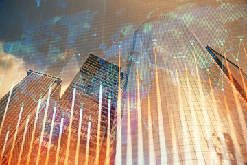 Forex chart on cityscape with skyscrapers wallpaper multi exposure. Financial research concept.