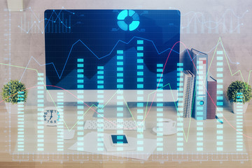 Forex graph hologram on table with computer background. Double exposure. Concept of financial markets.