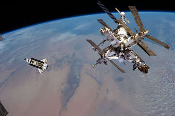 Wall Mural - Spaceships in space. Science theme. The elements of this image furnished by NASA.