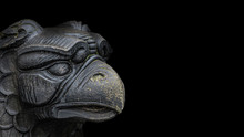 Banner Of Ancient Statue Of Medieval Griffin, A Hybrid Of Lion And Bird, Covered With Moss Isolated At Black Background With Paste Space, Closeup, Details
