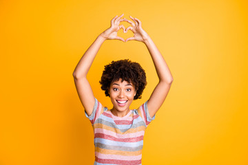 Canvas Print - Close-up portrait of her she nice attractive lovely cheerful girlish wavy-haired girl showing rising up heart gesture peace isolated over bright vivid shine vibrant yellow color background