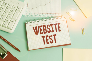 Handwriting text Website Test. Conceptual photo test the websites or web applications for potential bugs Paper blue desk computer keyboard office study notebook chart numbers memo