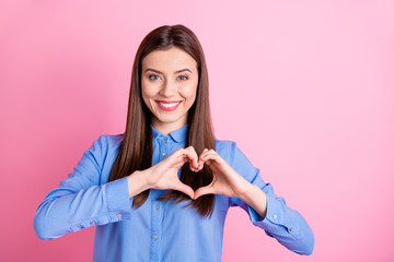 Wall Mural - Photo of pretty lady showing heart symbol with arms creative prom invitation for boyfriend wear blue dotted shirt isolated pink color background