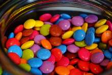 Glass Jar Filled With Colorful Sugar-coated Chocolate Candies