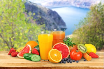 Sticker - Tasty fruits  and juice with vitamins on background