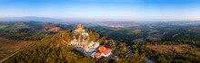 Top View Aerial Photo From Flying Drone.The Beautiful  Of Thai Temple (Wat Pa Phu Hai Long) On The Top Of Mountain  In Pak Chong District,Nakorn Ratchasima, Thailand.