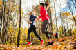 © Louis-Paul Photo - Two running woman jogging in autumn nature