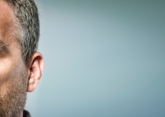 human ear detail from sideview attention concept