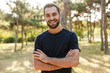 © Drobot Dean - Sports man posing outdoors in nature green park.