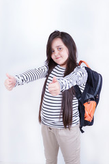 Schoolgirl shows two fingers up, positive emotions.