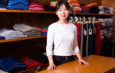 Salesgirl of clothing store