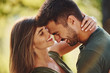 © standret - Feeling good to be together. Beautiful young couple have a good time in the forest at daytime