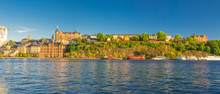 Panoramic View Of Sodermalm Island With Multicolor Colorful Fishing Boats And Ships On Lake Malaren, Typical Traditional Buildings, Monteliusvagen View Platform, Clear Blue Sky, Stockholm, Sweden