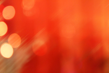 Festive christmas background. Red gradient with highlights and bokeh.