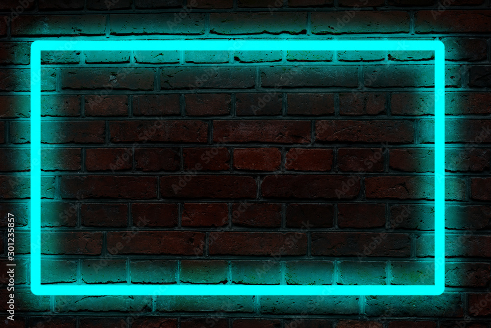 blue neon light on a brick wall at night Stock Photo | Adobe Stock