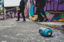 Graffiti Spray Can On The Ground