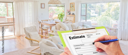 Cuadros en Lienzo Banner Builder Hand writing estimate on a clipboard to renovate a house interior