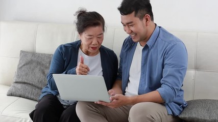 Wall Mural - Asian mother and son lifestyle in living room