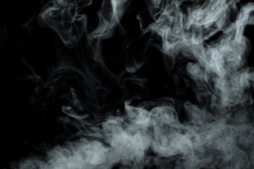 Wall Mural - Abstract powder or smoke isolated on black background