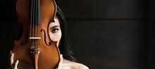 Close Up Portrait Of Young Asian Woman Playing Violin Vintage Style With Copy Space. Musician Orchestra Performer Artist Lifestyle Concept Panoramic Banner