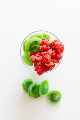 Canvas Print - Dried fruits in a glass bowl on white background.