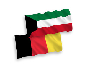 National vector fabric wave flags of Kuwait and Belgium isolated on white background. 1 to 2 proportion.