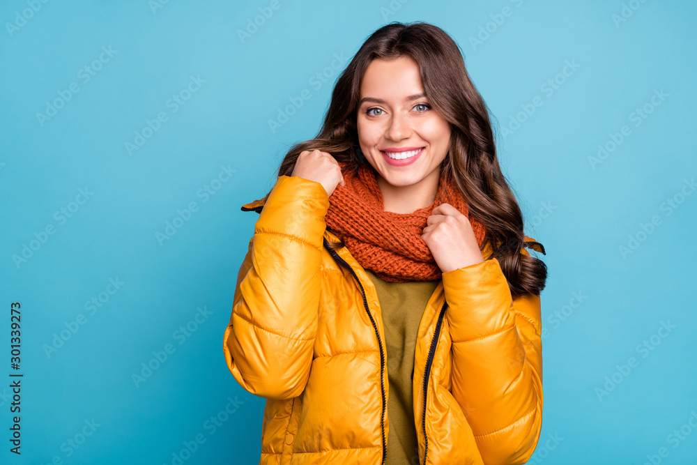 Closeup photo of amazing millennial lady easy-going person holding knitted scarf wear modern stylish autumn windbreaker isolated blue color background - obrazy, fototapety, plakaty 