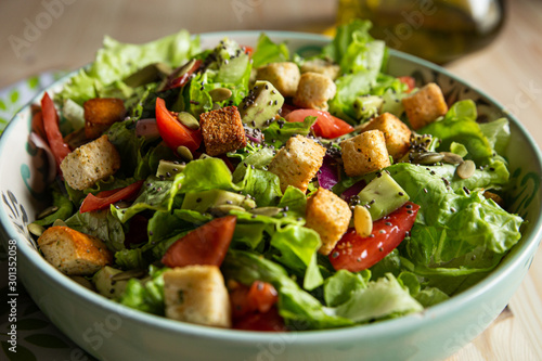 Fotomural salad with tomatoes, avocados, close-up