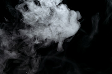 Wall Mural - Abstract powder or smoke effect isolated on black background