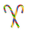 Rainbow colored candy cane isolated on white background