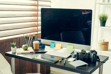 Wall Mural - Working table of a photographer close up