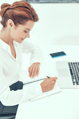 Wall Mural - Confident accountant at her workplace stock photo