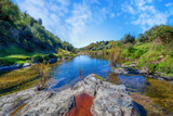 Fototapeta Krajobraz - Beautiful spring landscape with river and blue sky in South of Spain.