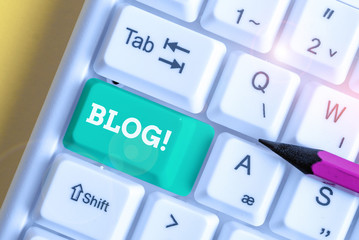 Handwriting text Blog. Conceptual photo regularly updated website or web page run by an individual or group White pc keyboard with empty note paper above white background key copy space