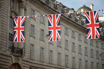 British Union Jack flag decorations strung across the streets of London, UK 