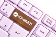 © Artur - Text sign showing Non Profit. Business photo text type of organization that does not earn profits for its owners White pc keyboard with empty note paper above white background key copy space