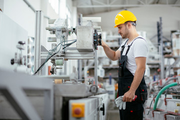 Portrait of man working in factory	