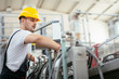 © JustLife - Portrait of worker in factory