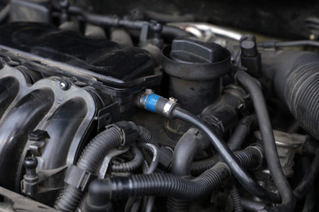 used car engine under repair, open hood