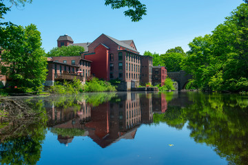 Sandford Mill on Charles River in Medway historic town center in summer, Medway, Boston Metro West area, Massachusetts, USA.