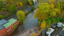 Aerial Footage Of The River Don Floods After Heavy Rainfall Flooding Local Offices And Buildings In Yorkshire And Bursting Over Flood Defences
