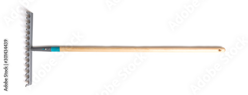 Cuadros en Lienzo Rake with a wood handle isolated over a white background