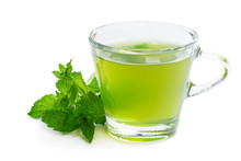 Green Mint Tea In Clear Glass Cup Isolated On White