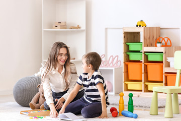 Canvas Print - Cute little boy at speech therapist office