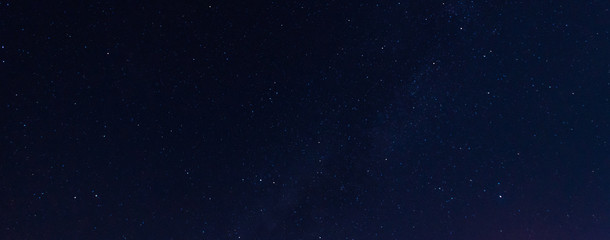 Amazing Beautiful night sky,Universe filled with stars, nebula and galaxy with noise and grain.Photo by long exposure and select white balance.selection focus