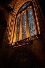 Wall Mural - LIVERPOOL, ENGLAND, DECEMBER 27, 2018: Entrance stained glass from interior of the Church of England Anglican Cathedral of the Diocese of Liverpool.