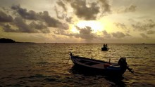 Two Small Boat Running Silhoutte In Sea Of Barbados